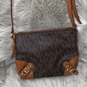 Michael Korrs cross body bag